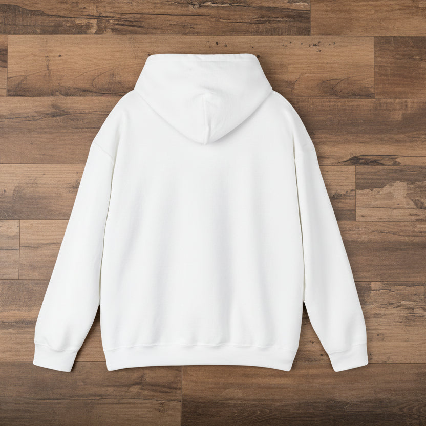 White hoodie on a wooden surface