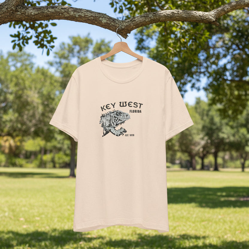 Beige t-shirt with 'Key West, Florida' graphic on a hanger against a white background