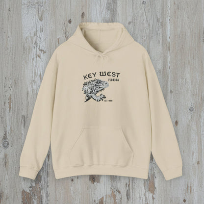 Beige hoodie with 'Key West, Florida' text and graphic on a wooden surface
